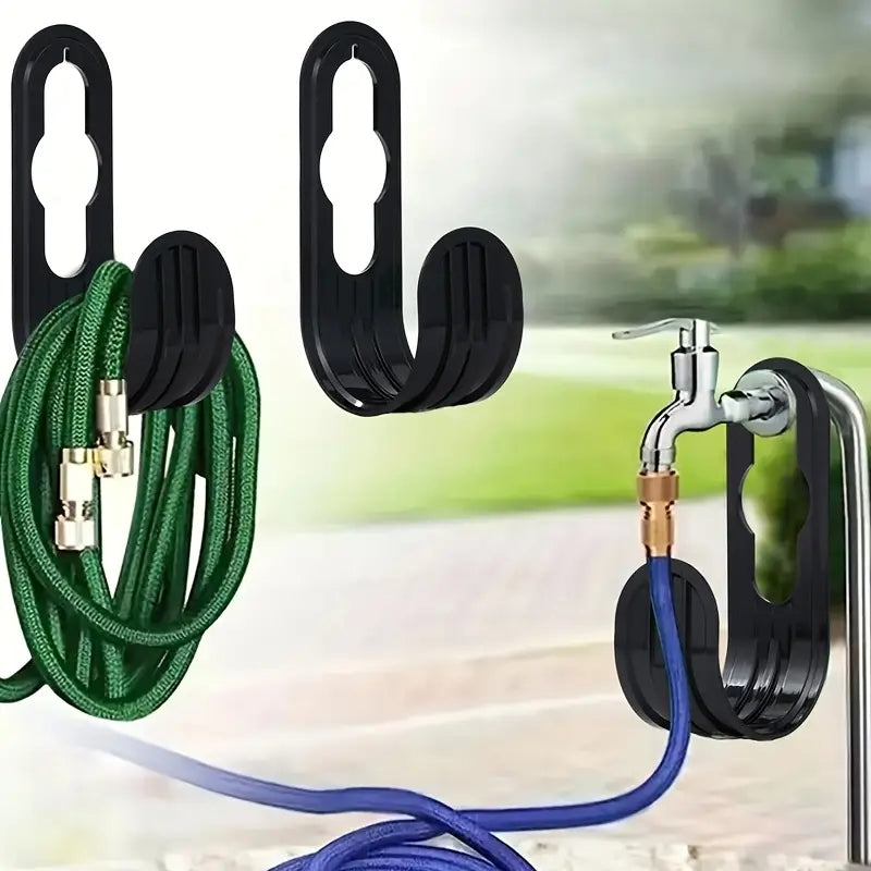 Black garden hose hanger — one hanger included